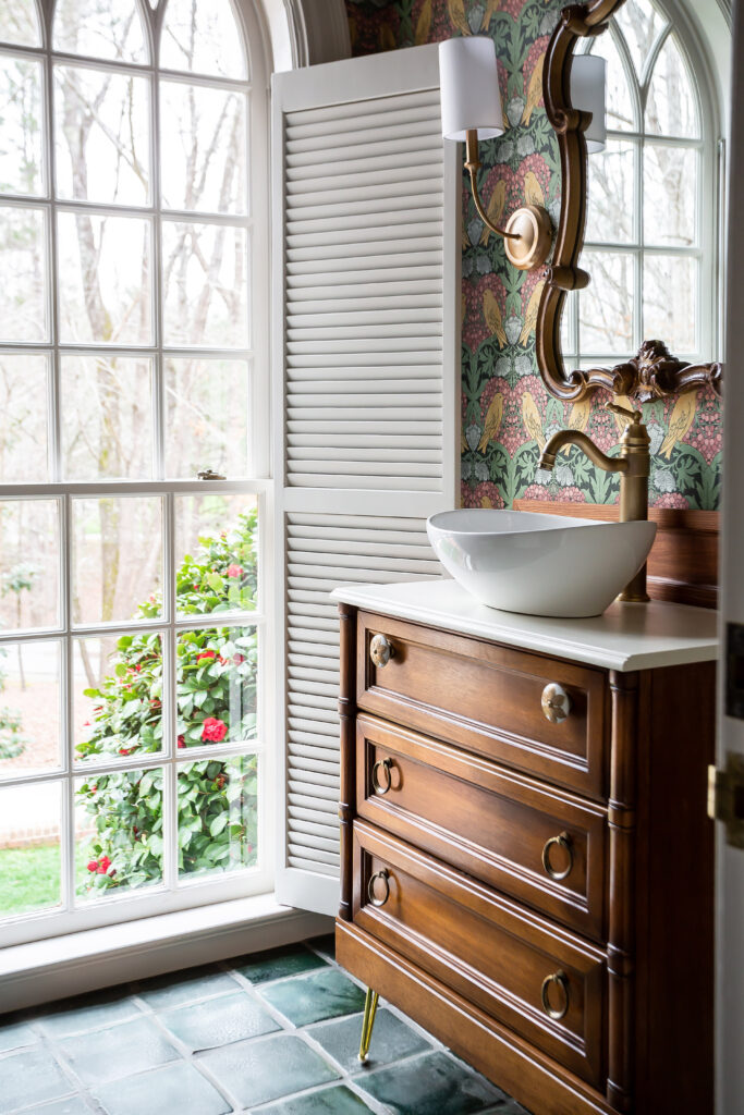 Bathroom vanity with a vessel sink next to a floor to ceiling window | Interior Design bathroom fixture details by Lindsay Speace Interiors Photographed by Interior Photographer Sara Coffin Photo